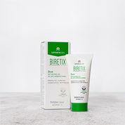 A tube and box packaging of BIRETIX Duo Anti-Blemish Gel