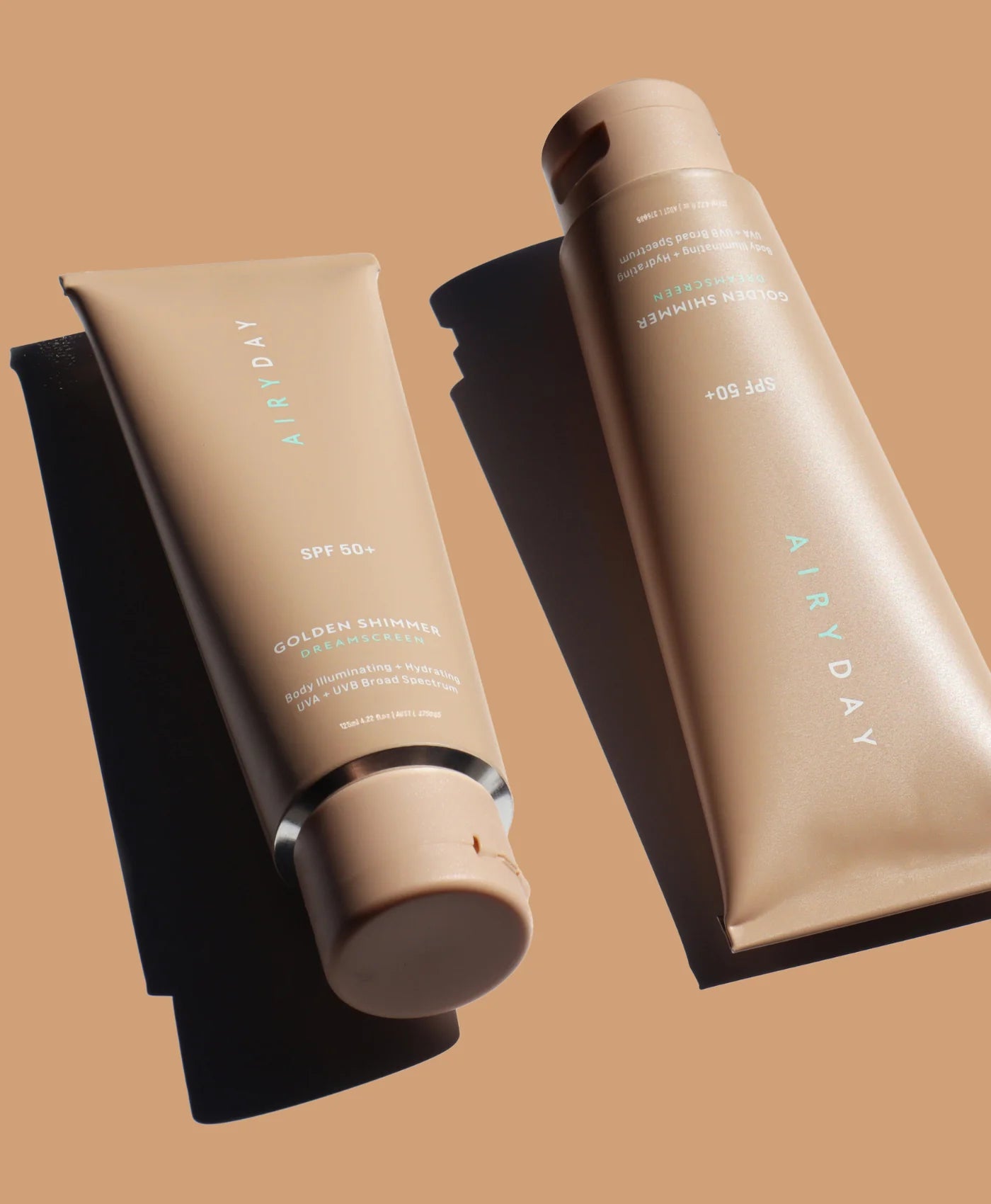 two tubes of Airyday Golden Shimmer Body SPF50+ Dreamscreen 125 ml