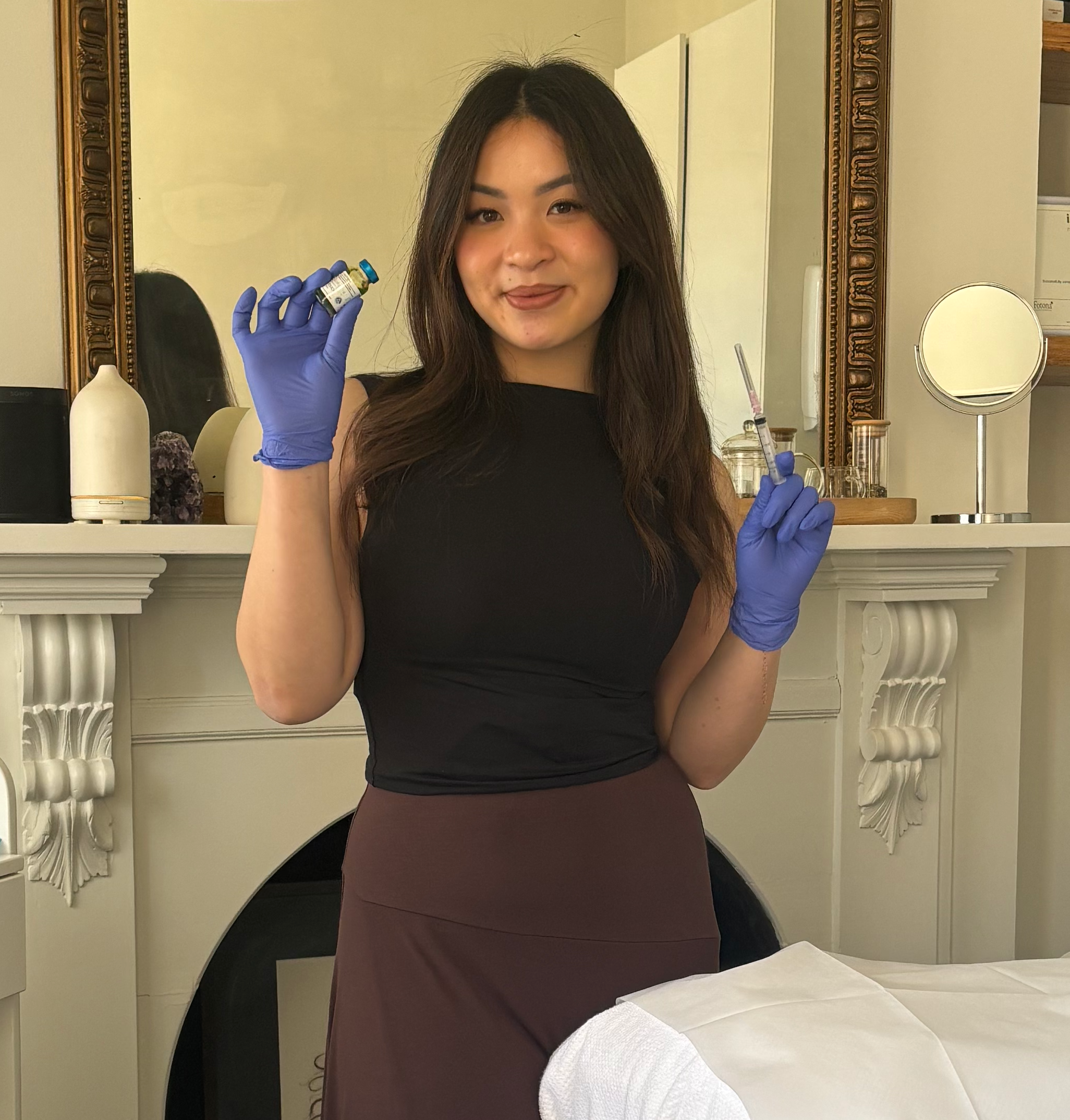 kim front of house of skin to heart